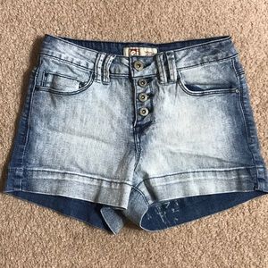 Denim high-waisted, button up shorts.